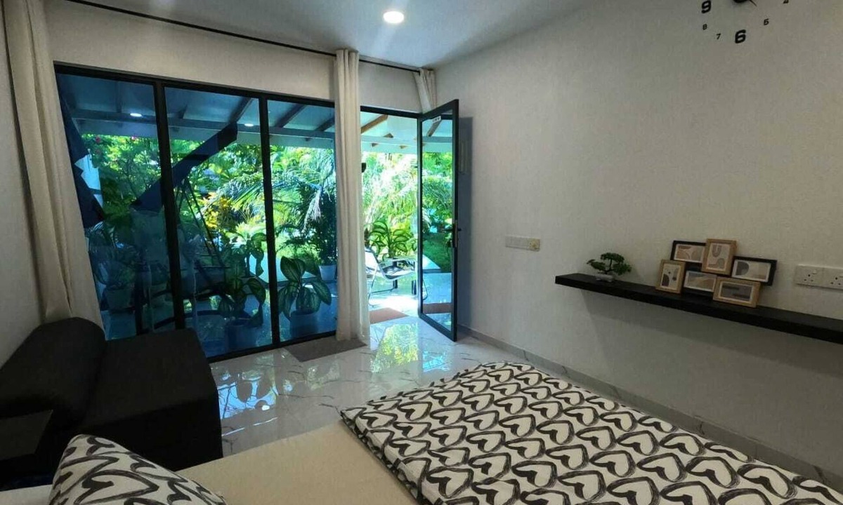 Kudahuvadhoo Hotel | Wake Up to Garden Views and Crisp Island Air"