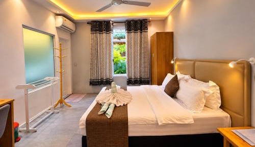 Deluxe Garden View with Free Infant Return Transfer