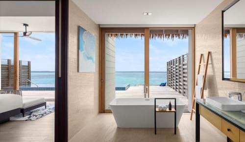 Three Bedroom Sunset Water Villa with private pool & free access to VIP seaplane lounge on arrival with $50 Spa credit & kids stay & dine free